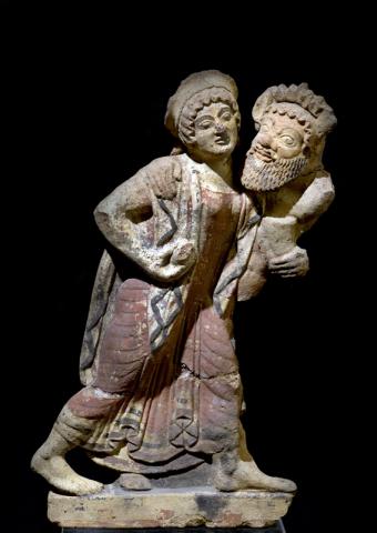 Antefissa in terracotta dipinta con Satiro e Menade. Restituzione Getty Museum